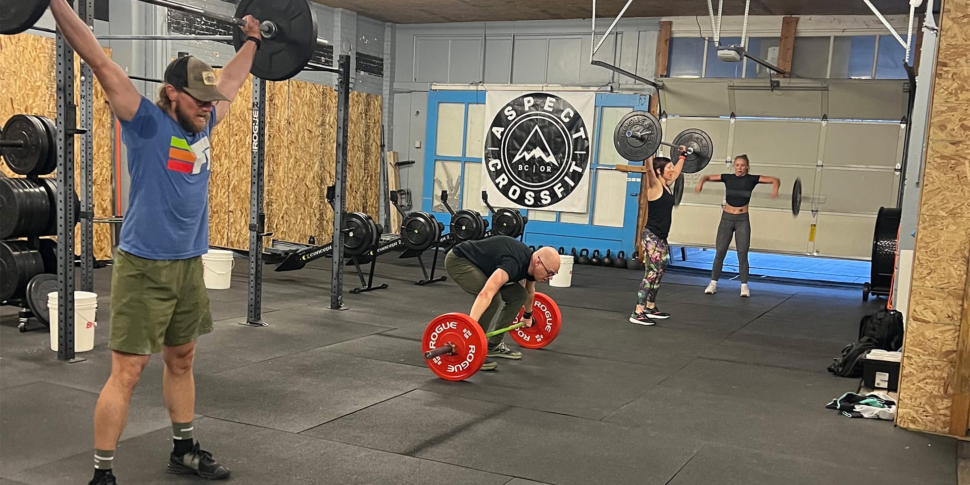 people lifting weights at Aspect CrossFit